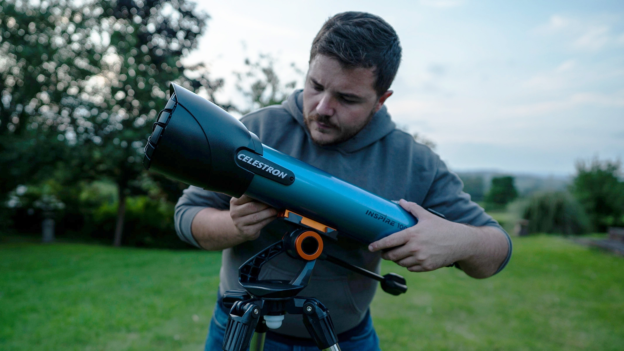 man using the Celestron Inspire 100AZ