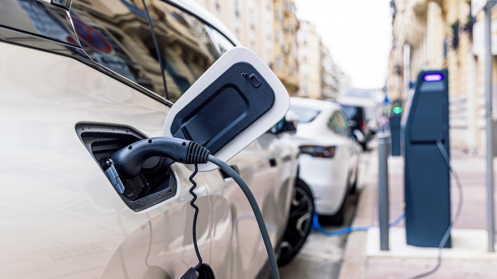 a close-up of an electric vehicle's charging port